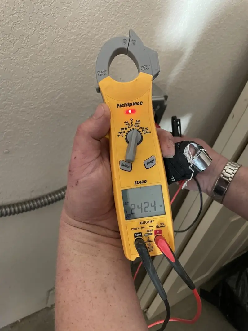 Voltage testing with clamp meter during Electrical Installation Services in Ladysmith